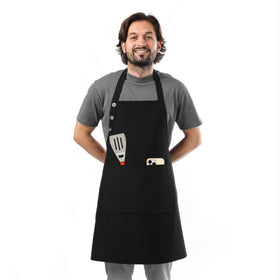 TOSHE waterdrop-resistant cotton apron in black protects clothing during cooking.
