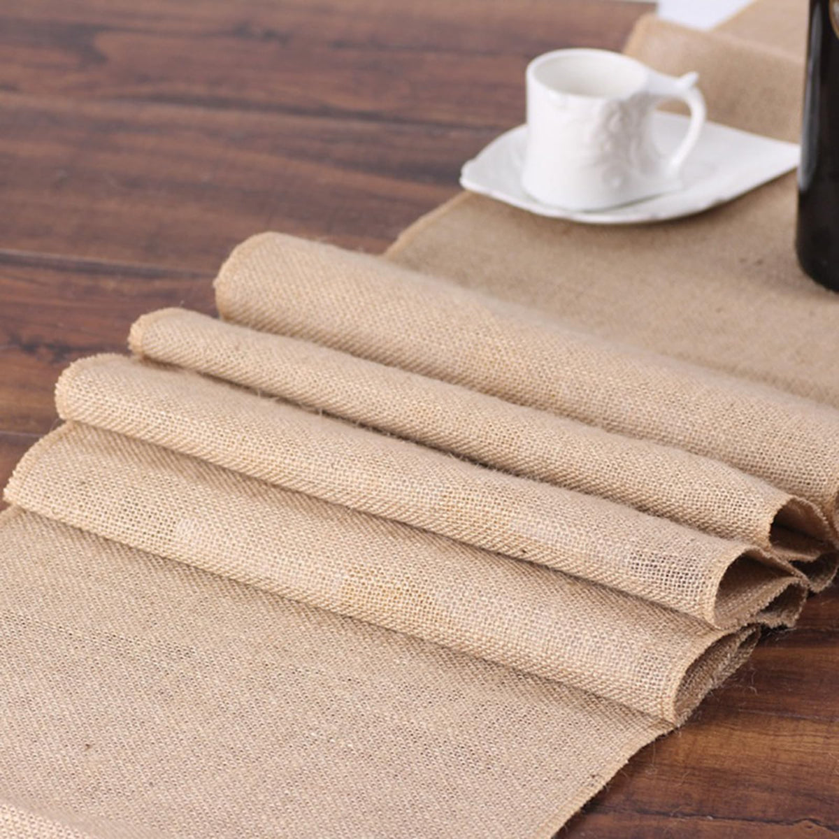 Tosnail burlap table runner close-up edge stitching on dining setup