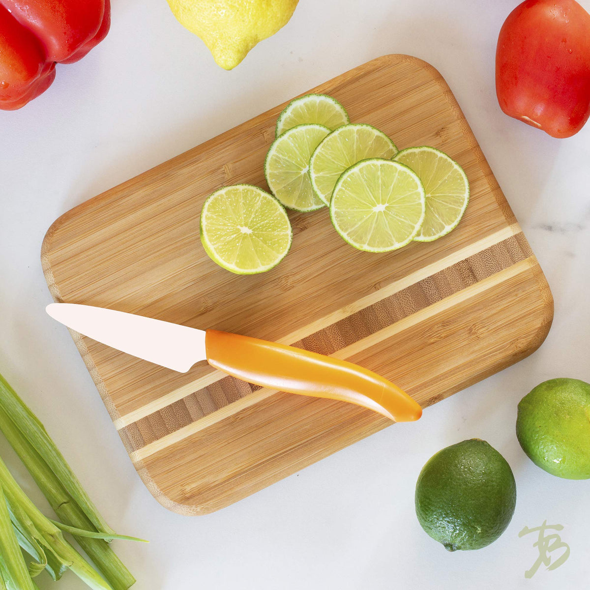 Totally Bamboo Barbados Caribbean Collection board on counter for compact chopping.