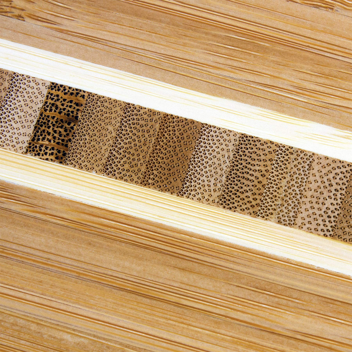 Totally Bamboo Barbados end-grain surface helps preserve knife sharpness during garnish prep.