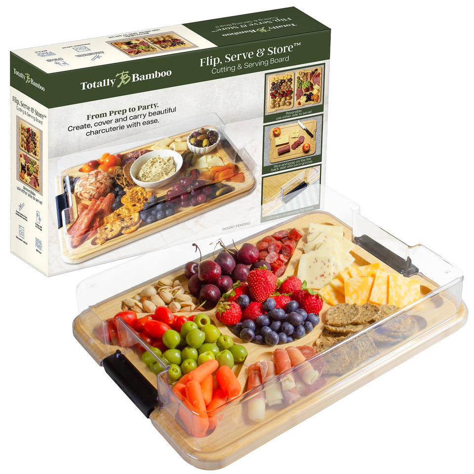 Totally Bamboo flip-serve-store board with lid for easy transport and freshness.
