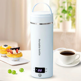 Touxila travel kettle front view in blue highlights compact 400 ml capacity.