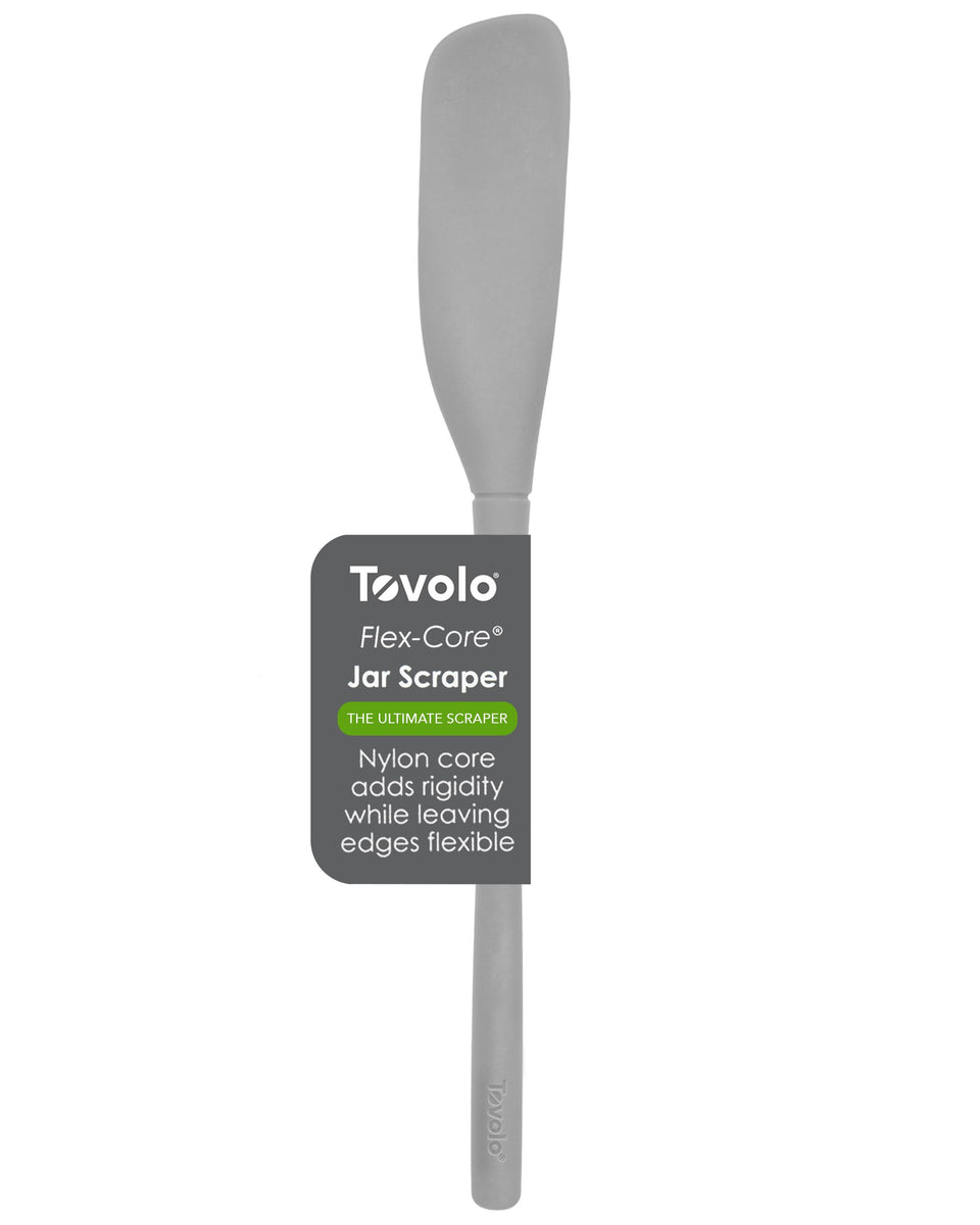 Tovolo Flex Core jar scraper with 12-inch reach cleaning a tall jar
