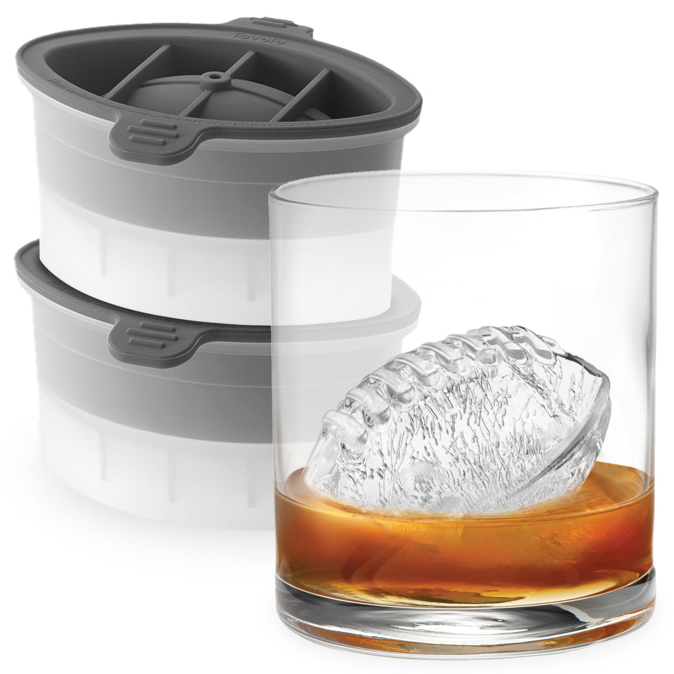 Tovolo football ice cube mold 2-pack creates large football-shaped ice cubes for cocktails
