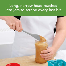 Tovolo long-handle silicone spatula showing extended reach