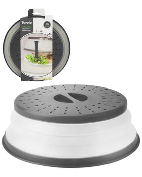 Tovolo microwave splatter cover in charcoal over a plate for mess-free reheating