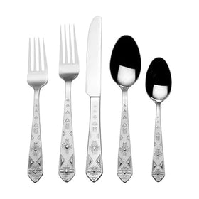 Towle Everyday Pueblo full 20-piece flatware set on a stylish table for entertaining.