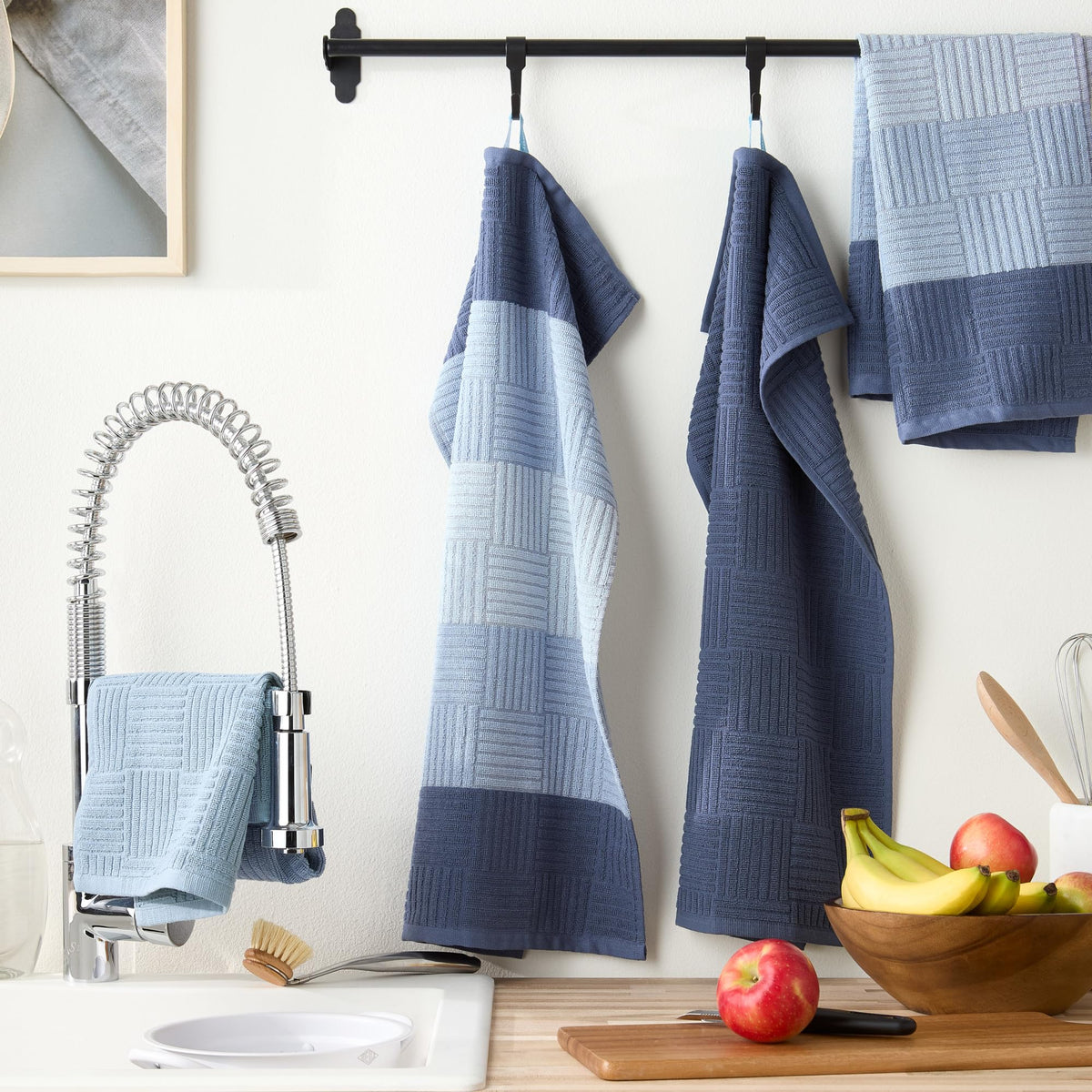 Town & Country Basics basketweave towel blue folded for compact storage and soft texture.