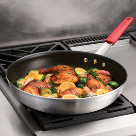 Tramontina Professional 14-inch pan handle with grip enables easy sautéing.