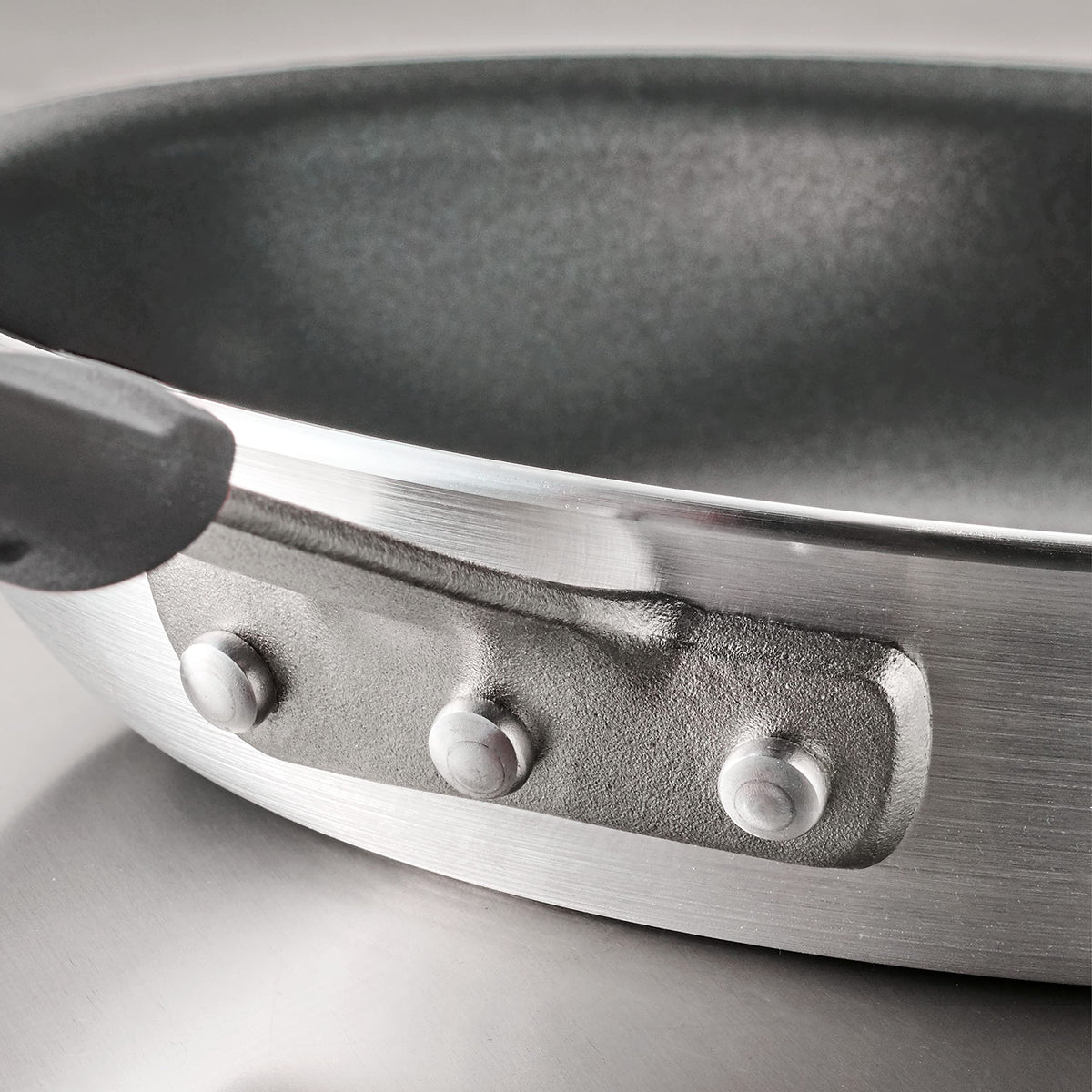 Tramontina Stainless-steel handle with removable silicone sleeve for oven versatility