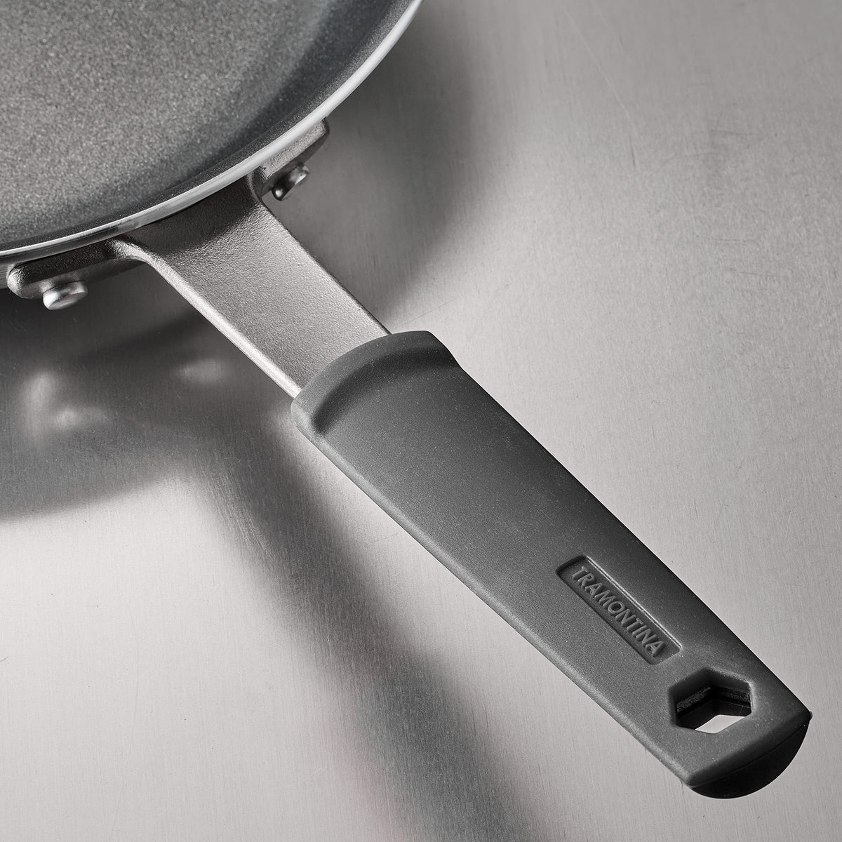 Oven-ready Tramontina Fusion pan up to 400°F with removable silicone sleeve