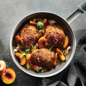 Tramontina Professional Fusion fry pan close-up of reinforced nonstick coating for easy release