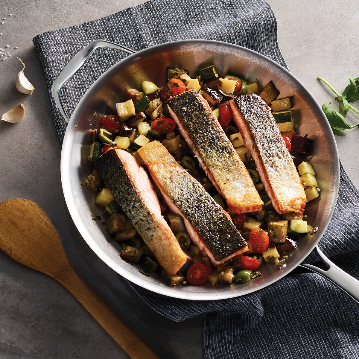 Tramontina Signature Tri-Ply pan with a mirror-polished exterior elevates kitchen presentation