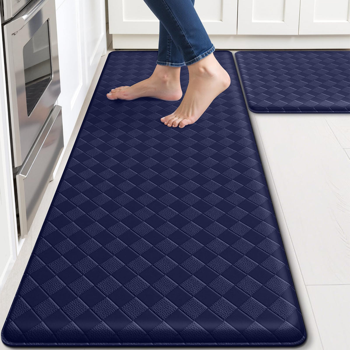 TranquilRelax kitchen mats at the front sink provide cushioned support for comfort during chores.