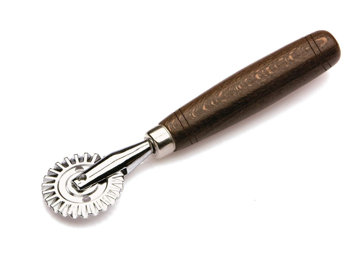 Tredoni pastry wheel for stamping—even decorative patterns on fresh dough.