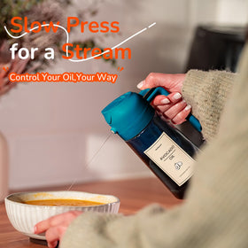 TrendPlain oil bottle design blocks light to keep olive oil fresh.