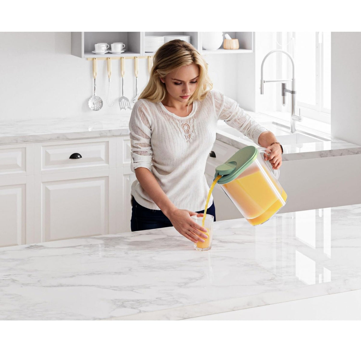 Tribello pivot-top spout enables smooth, drip-free pouring from the pitcher.