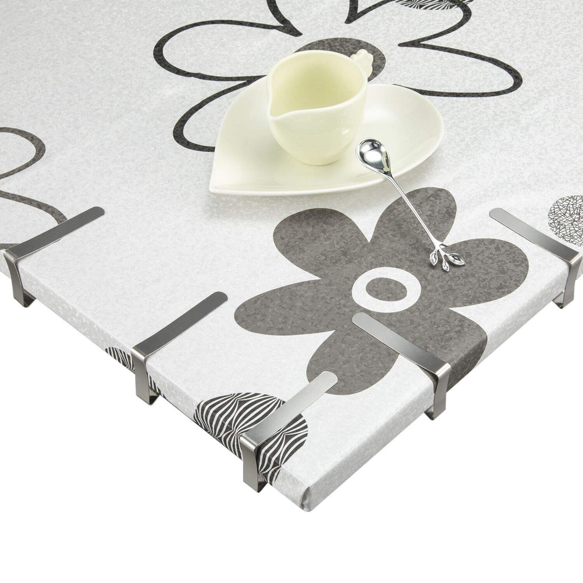 TriPole tablecloth clip protects fabric during outdoor buffets and dining.