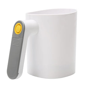 TriTree battery-operated flour sifter, side view, compact for effortless baking prep.