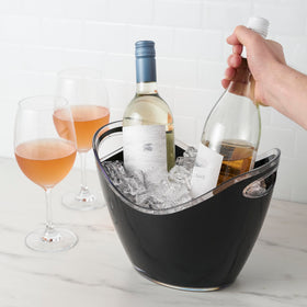 Outdoor scene with the TRUE beverage tub for beach or patio use.