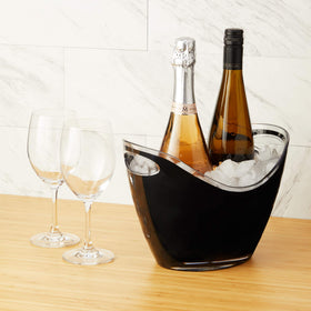Elegant table setup with TRUE bucket keeping wine chilled and accessible.