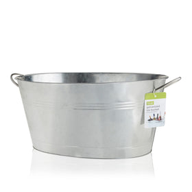 TRUE dining-table centerpiece tub used for drinks and ice in a stylish setting.