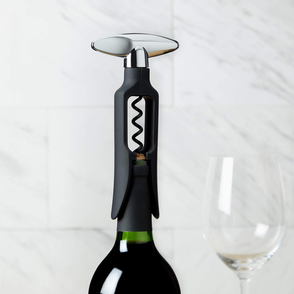 TRUE Self-Pulling Corkscrew in use at a home bar for easy service