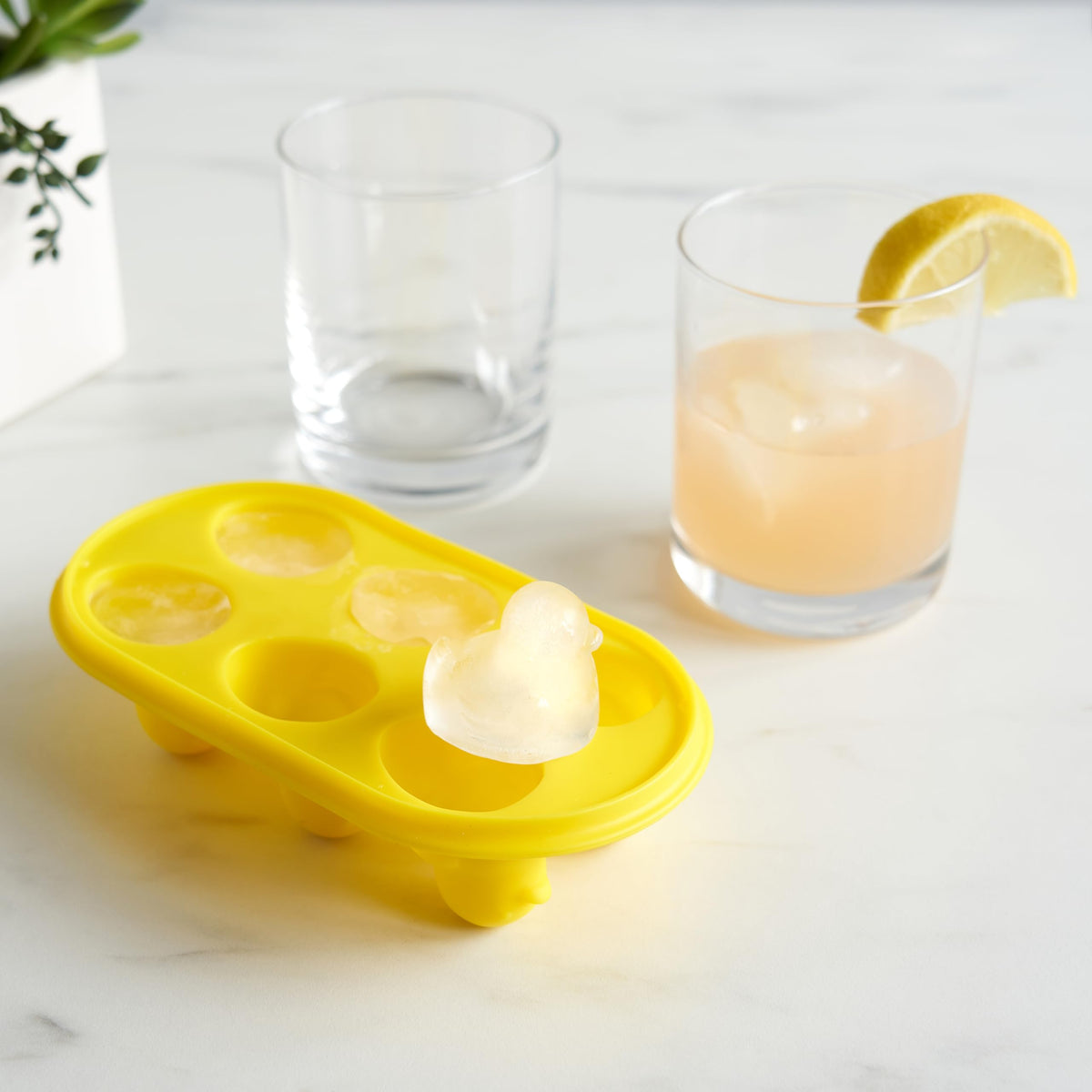 Duck-shaped ice tray on a stylish bar cart for entertaining