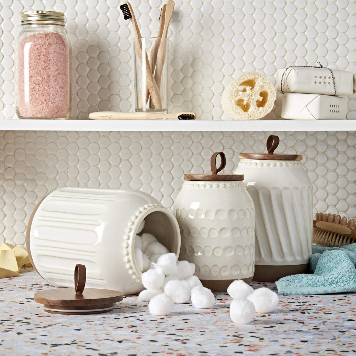 TTU Ziggy white medium canister with acacia lid keeps pantry items fresh.