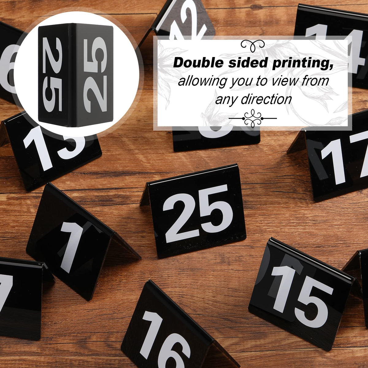 Tuanse table numbers with bold white digits on black acrylic for high contrast.