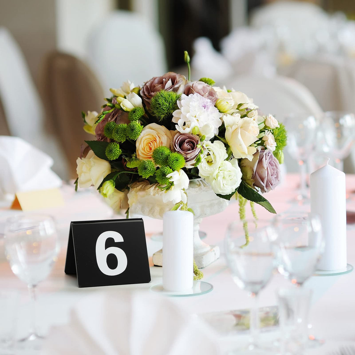 Tuanse table numbers measure 2.5 x 2.17 x 2 inches for compact placement.