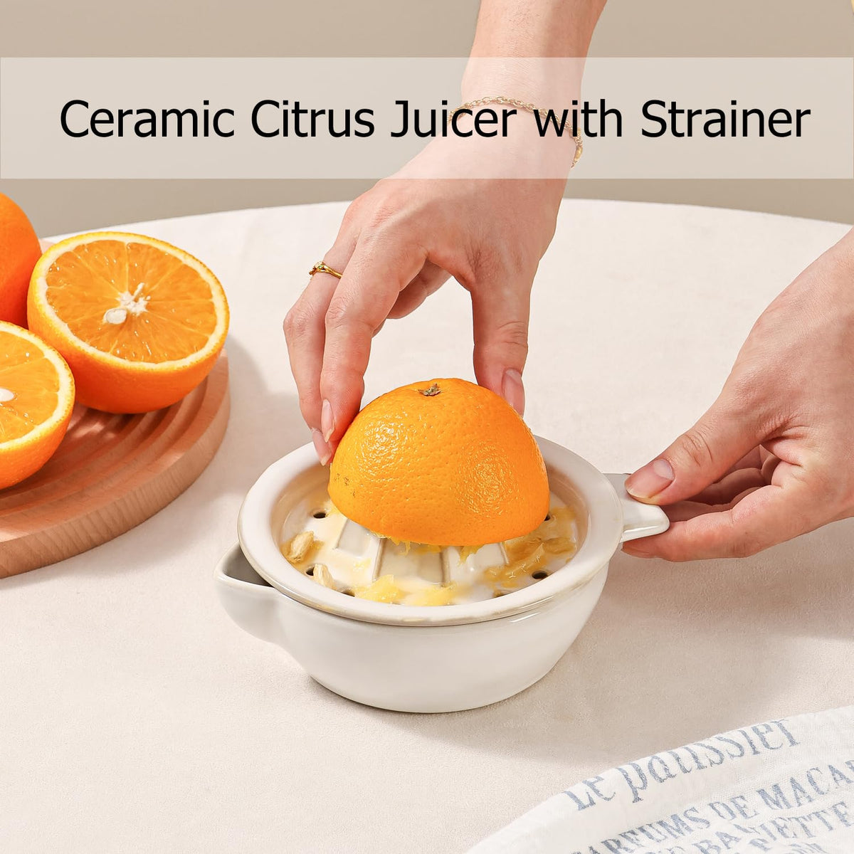 Tuioyoc ceramic citrus juicer base bowl holds 6.8oz of juice for easy pouring.