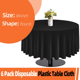 Tujol Black 84-inch round tablecloth in use on a dining table