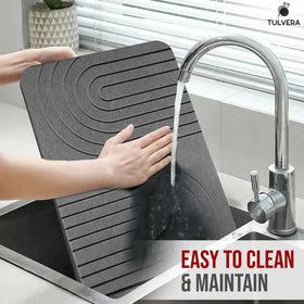 Tulvera minimalist stone dish drying mat in a clean modern kitchen.