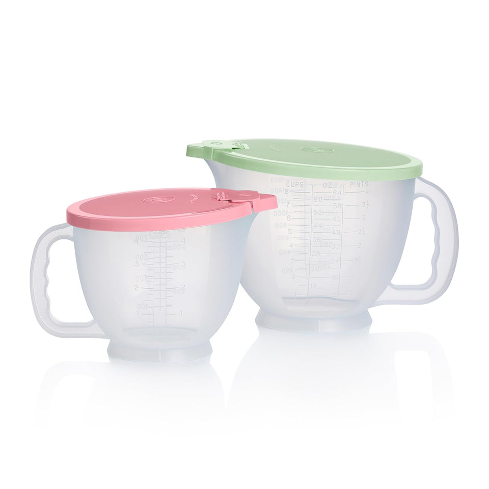 Tupperware Classic Mix-N-Store pitcher in mint green ready for mixing and pouring.