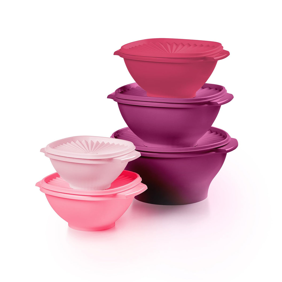 Tupperware Heritage vintage pink bowls with sunburst design for airtight freshness.
