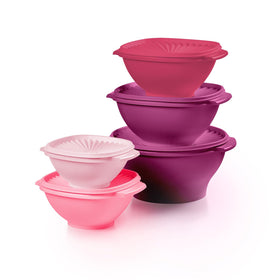 Tupperware Heritage vintage pink bowls with sunburst design for airtight freshness.