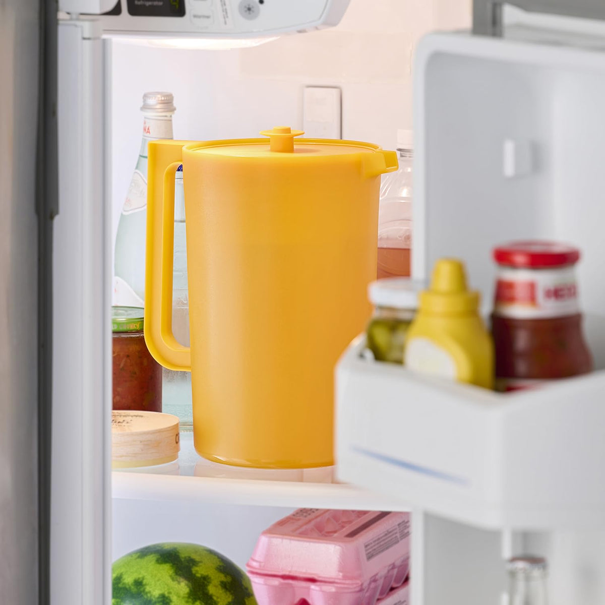 Tupperware Impressions pitcher BPA-free plastic supports everyday reuse.
