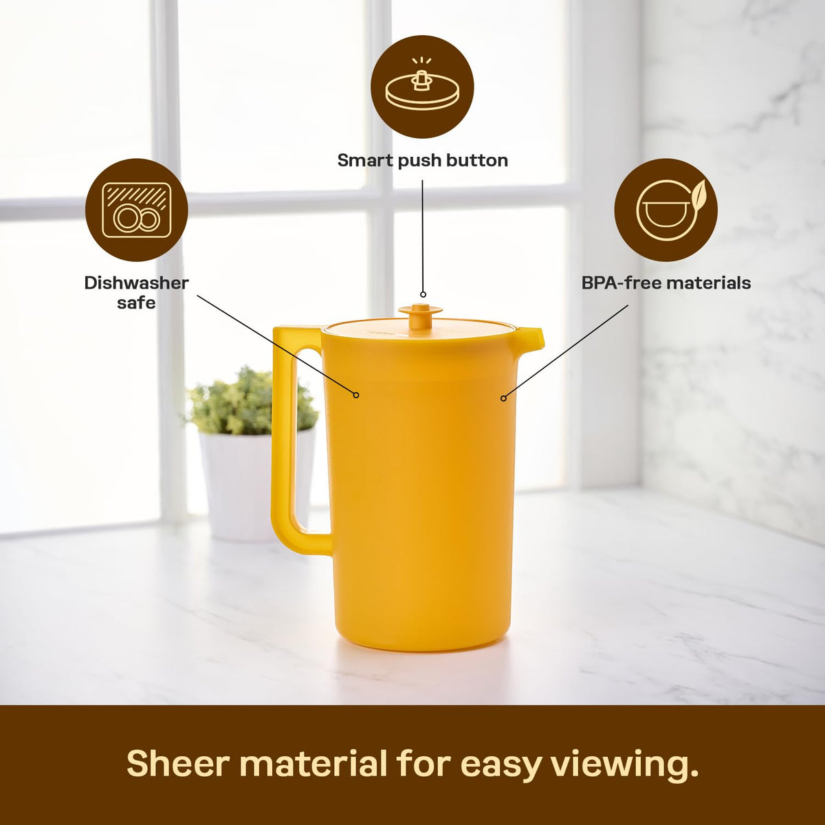 Tupperware Impressions pitcher ergonomic handle offers comfortable carrying and pouring.