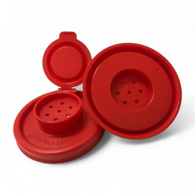 Tupperware hourglass salt and pepper set on kitchen counter for easy access