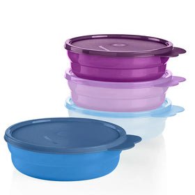Tupperware microwave cereal bowls set with four bowls and lids, ready for reheating.