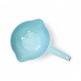 Tupperware small colander with ergonomic-handle, comfortable use over the sink.