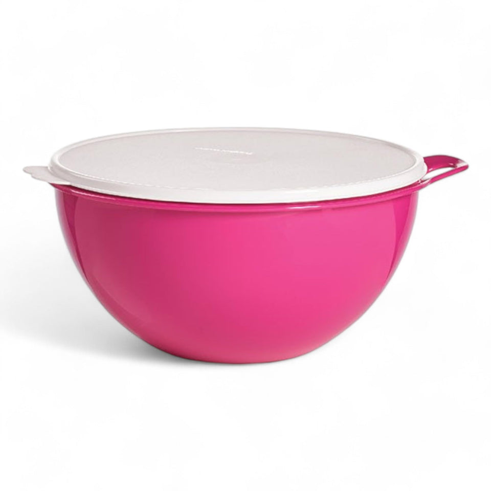 Tupperware Thatsa Bowl hot pink with white seal, perfect for mixing and on-the-go storage.