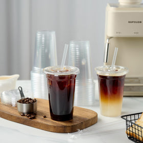 Lids with splash-back edge minimize spills during sipping