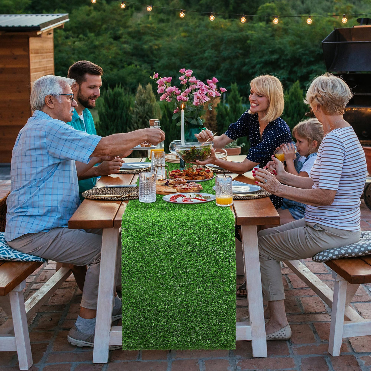 TURSTIN indoor-outdoor use grass runner adds greenery to any setting.