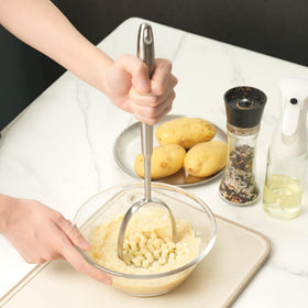 Tuyotue ergonomic-handle masher delivers comfortable grip during use.