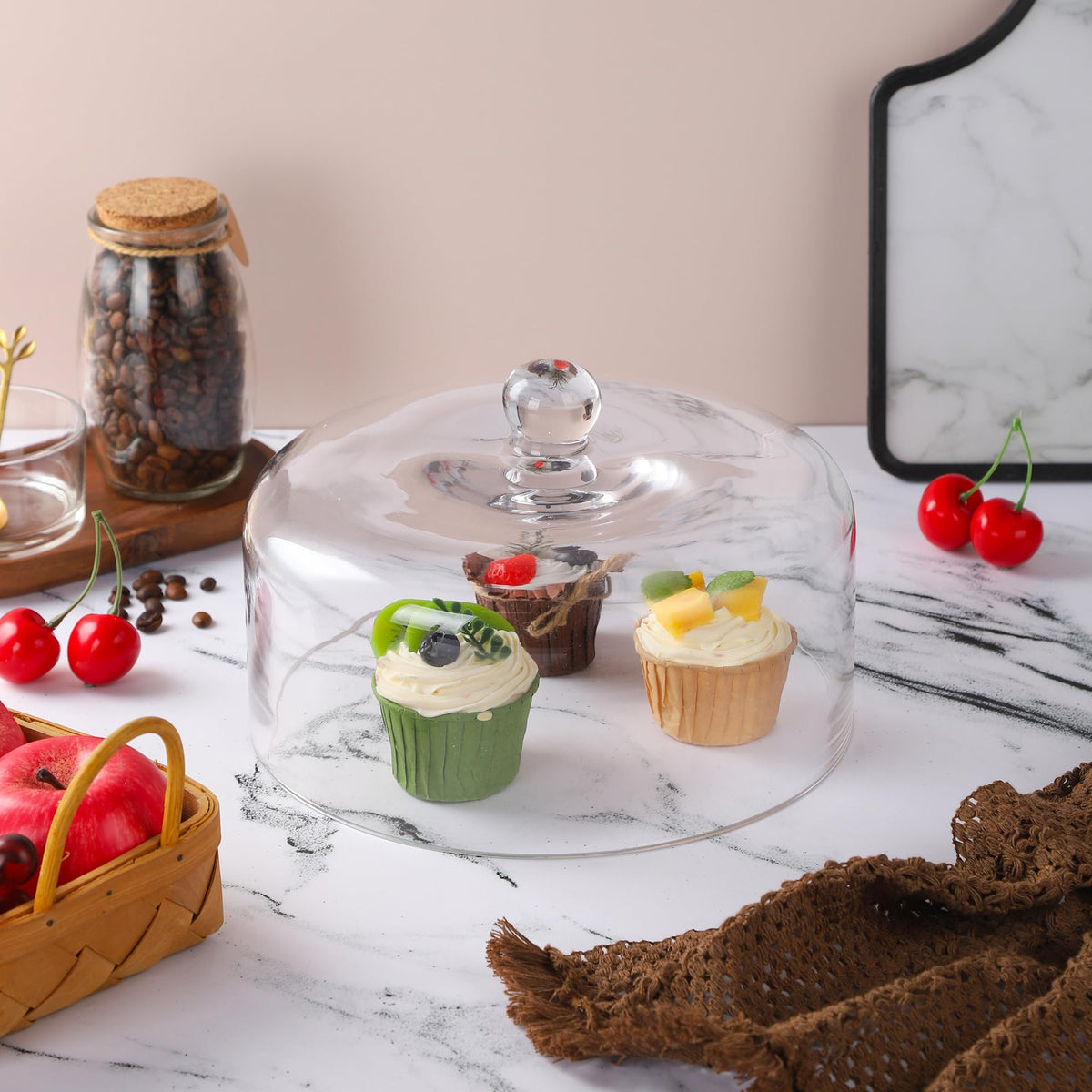 Twakutwaku glass dome display top improves presentation while reducing fridge odors