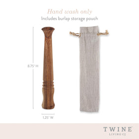 Twine Acacia muddler in use for mint julep or mojito flavor extraction.