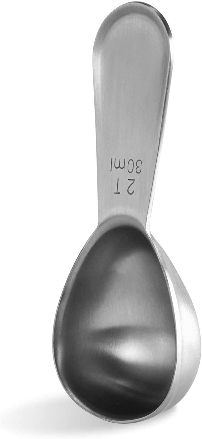 U-Taste coffee scoop close-up shows 2 Tbsp capacity for precise portions.