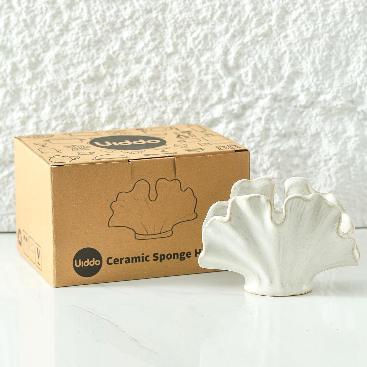 Uiddo compact sink caddy keeps countertops clutter-free while organizing scouring pads.